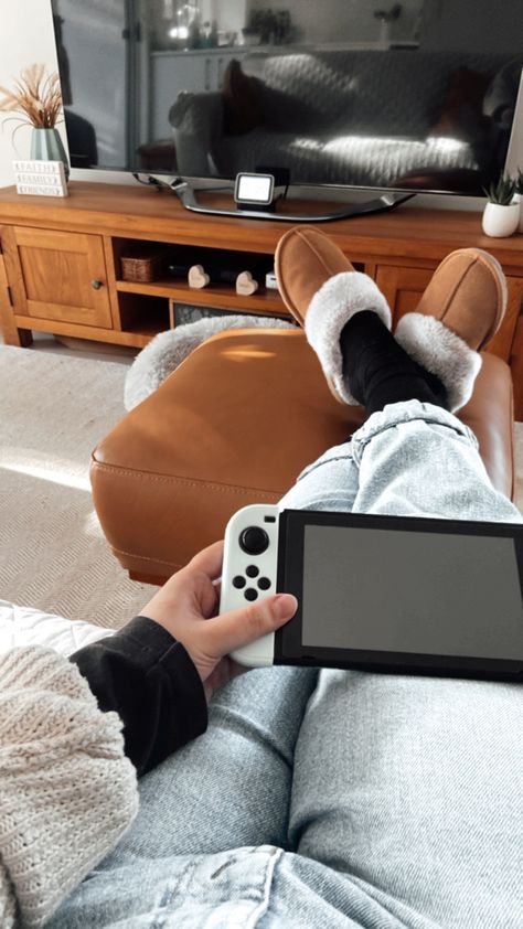 Playing a Nintendo switch on the couch Switch Astethic, Cozy Video Game Aesthetic, Switch Aesthetic, Cosy Games Switch, Video Game Aesthetic, Cosy Nintendo Switch Games, Nintendo Switch Aesthetic, Cozy Gaming Switch, Cozy Gamer Aesthetic Switch