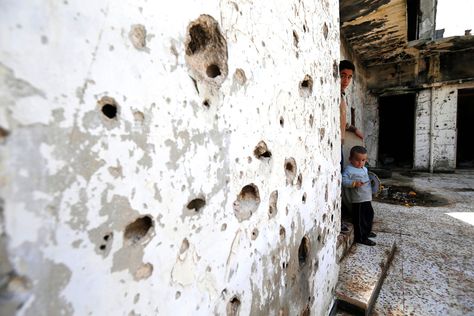 In this picture taken on February 26, 2016, Syrian boys are seen inside their destroyed house at neighborhood of Baba Amr in Homs, Syria. Homs Syria, Destroyed House, Arabian Oryx, Sea Of Clouds, Spoken Arabic, Lost In Translation, Syria, Honduras, Ecuador