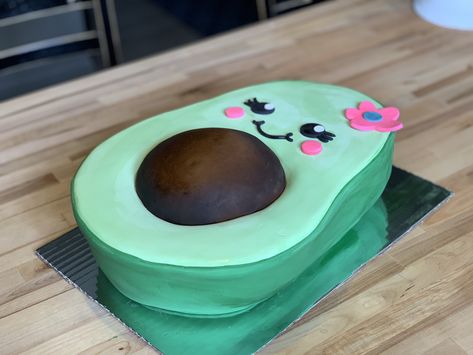 Custom made avocado cake. This was designed after a little girls plushie. #customcake #avocadocake #birthdaycake #avocado #girlsbirthdaycake Avocado Cake Decoration, Avocado Shaped Cake, Avocado Theme Cake, Cute Avocado Birthday Cake, Avocado Cake Design, Avocado Birthday Cake, Dory Birthday Cake, Avocado Birthday, Avocado Party