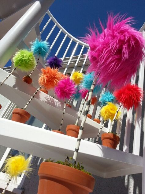 Dr. Seuss inspired Truffula trees The Lorax Trees Diy, Lorax Parade Float, How To Make Truffula Trees, The Lorax Party Decorations, Lorax Trees Diy, Lorax Decoration Ideas, Dr Seuss Balloon Arch, Dr Seuss Decor, Lorax Trunk Or Treat