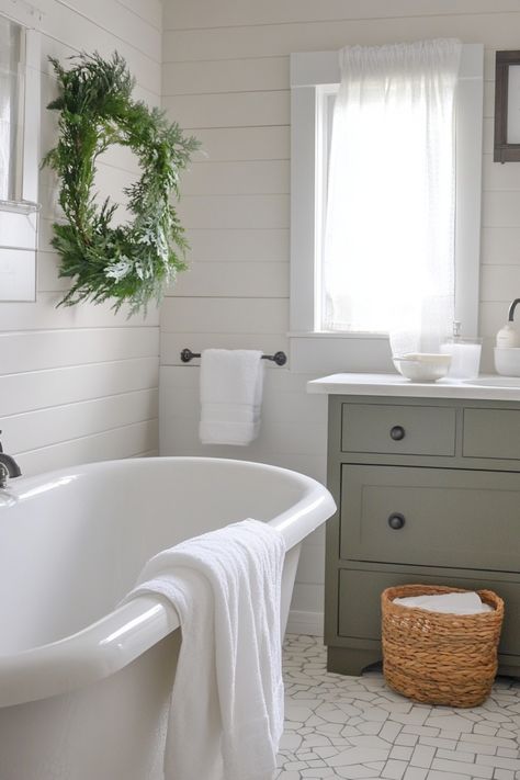 Elegant bathroom with a white freestanding tub and green vanity. Coastal Farmhouse Bathroom, Small Farmhouse Bathroom, Coastal Farmhouse Style, Coastal Farmhouse Decor, Coastal Bathroom, Farmhouse Paint, Cottage Bathroom, Bathroom Paint Colors, Coastal Bathrooms