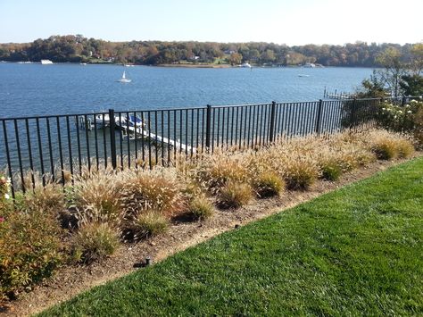 This is a 4' High 2-rail Alumi-Guard aluminum residential grade black fence. This fence was a great option with the property being waterfront to allow visibility and low maintenance. Waterfront Fencing Ideas, Waterfront Fence Ideas, Lake Fence, Modern Fences, Waterfront House, Country Fences, Fence Plants, Green Fence, Black Fence