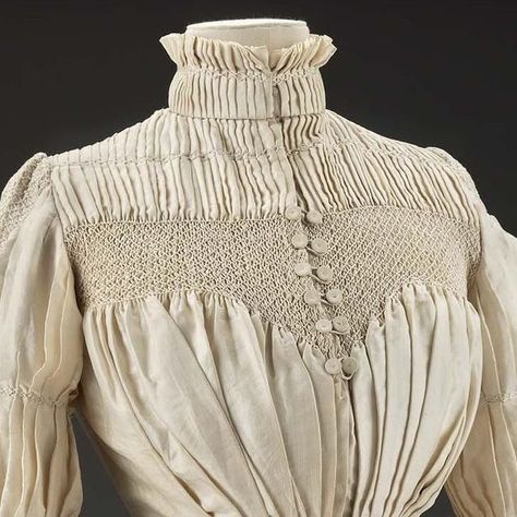 Foundations Revealed - The Historical Sewing Academy on Instagram: "*Friday Finery*  Woman's blouse, Liberty & Co,1890s.  "Liberty & Co. of Regent Street in London was well-known in the late nineteenth century as a purveyor of fine fabrics and eastern wares closely associated with the Aesthetic Movement. In 1884, they opened a costume department, producing garments that were strongly influenced by Rational dress theories and Aesthetic movement sensibilities. Garments like this one that bear the label of the Liberty & Co. Artistic and Historic Costume Studio are quite rare. Made of cream silk gathered into pleats with small puffed sleeves and smocking across the yoke, this blouse is an excellent example of historically-inspired artistic dress of the late 1890s." - MFA Boston  MFA Boston (20 Artistic Dress, Costume Department, Historical Sewing, Smocked Clothes, Yoke Dress, Regent Street, Aesthetic Dress, Smock Blouse, Aesthetic Movement