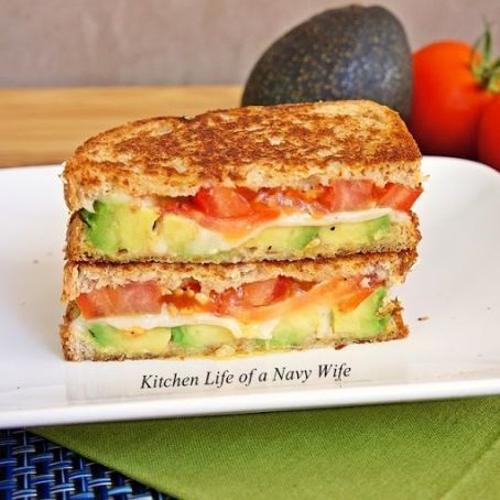 Avocado, Mozzarella and Tomato Grilled Cheese - To make this yummy sandwich, follow the oh-so-easy directions below. Think grilled cheese, and then some. Tomato Grilled Cheese, Mozzarella And Tomato, Grilled Sandwiches, Grilled Avocado, Sliced Avocado, Grilled Cheese Recipes, Idee Pasto, Avocado Tomato, Cheese Sandwich