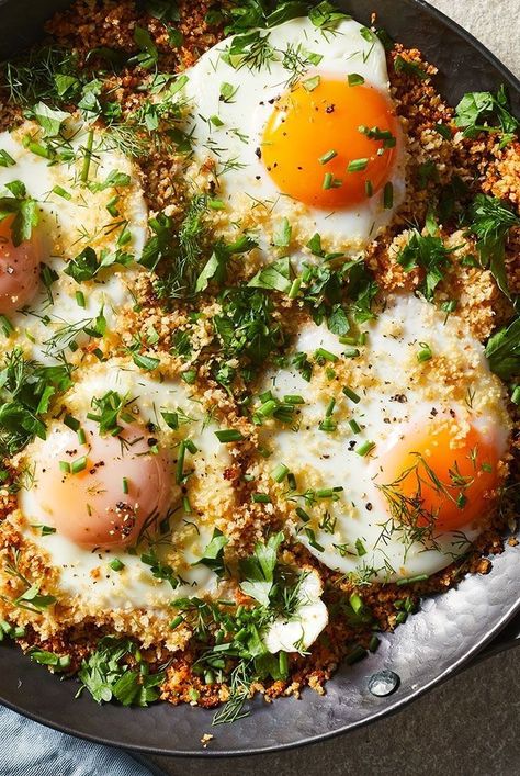 This recipe proves that with just a little extra effort, something as simple as a fried egg can be a true event. In the case of these herb-showered eggs, it's panko (Japanese-style breadcrumbs) that coats the bottom to create a crisp crust. Get the recipe for Crunchy Skillet Eggs With Herbs. Eggs Fried In Parmesan Breadcrumbs, Egg On Bread Breakfast, Breadcrumb Fried Eggs, Creme Fraiche Eggs, Cream Fried Eggs, Upscale Brunch Ideas, Fried Egg Recipes For Breakfast, Fried Eggs Breakfast, Scrambled Egg Recipes