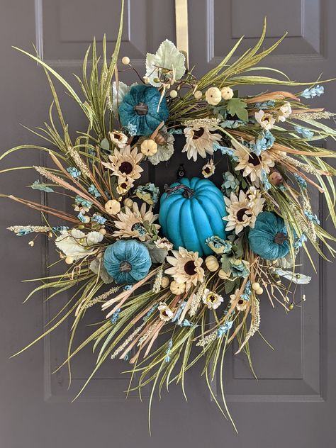 Teal Pumpkin Wreath with three small pumpkins and one large pumpkin in center surrounded by beautiful sword grass and beige sunflowers. Teal Pumpkin Decor, Teal Fall Decor, Teal Pumpkin, Fall Swags, Fall Grapevine Wreaths, Boho Wreath, Autumn Wreaths For Front Door, Statement Decor, Fall Decor Inspiration