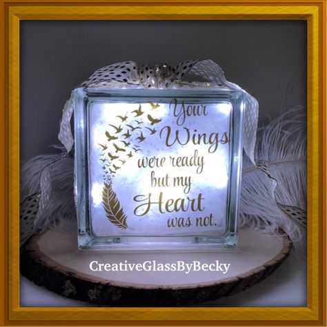 Another Beautiful Angel Wing Memorial Glass Block. Gold and White Wedding Decorations Gold, Memory Decor, Glass Block Crafts, Lighted Glass Blocks, Instead Of Flowers, Gold Wedding Decorations, Glass Block, Faux Stained Glass, Beautiful Decoration