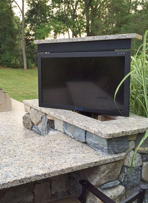 Outdoor Swivel TV Outdoor Tv Ideas Patio Design, Outdoor Rolling Tv Cabinet, Outdoor Retacting Tv, Outdoor Tv Ideas, Outdoor Tv Lift Cabinet, Diy Outdoor Tv Cabinet With Lift, Outdoor Tv Cabinets Weatherproof, Outdoor Swivel Tv Mount, Patio Tv