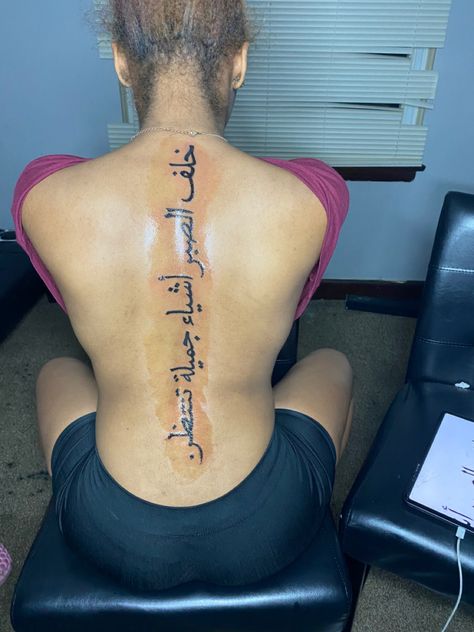 Back Tattoo In Arabic, Spine Tattoos For Women Arabic Writing, Arabic Tattoo Quotes For Women Spine, Arabic Tattoo Back Spine, Back Tattoo Women Spine Meaningful Japanese, Baddie Spine Tattoo With Meaning, Arabic Tattoo Quotes For Women On Back, Spine Tattoos For Women Japanese Letters, Short Spine Tattoos For Women