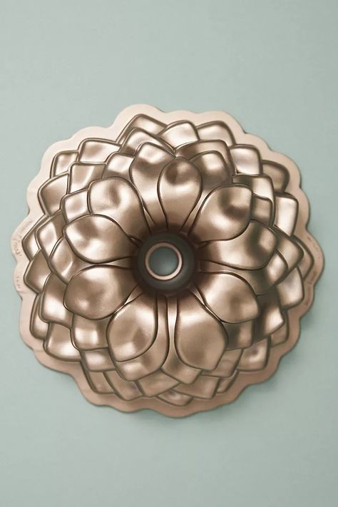 Nordic Ware Blossom Bundt Pan | Anthropologie Nordic Ware Bundt Pan, Bundt Pans, Kitchenware Products, Ceramic Butter Dish, Grill Set, Cooking Supplies, Nordic Ware, Bundt Pan, Cooking Pan