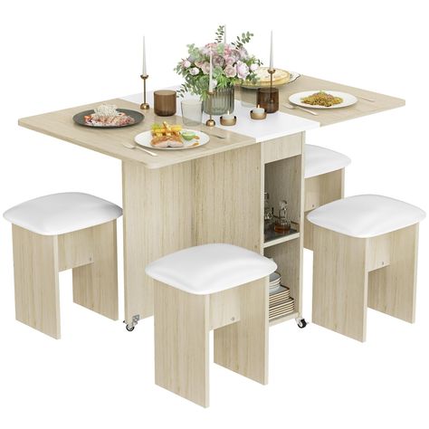 PRICES MAY VARY. 🍽️【Space-Saving】Folding dining table can be unfolded or stored anytime according to your needs. Fully unfolded, it is suitable for multi-person dining; half unfolded, it can be used as a wall-mounted office; fully folded, it can be used as a decorative cabinet, which is very flexible and maneuverable. 🍽️【Sturdy, Stable & Durable】Portable table and chairs are made of high-quality MDF and supportive universal wheels, long-lasting stability and durability. Comes with 4 chairs wit Foldable Dining Table, Unusual Furniture, Folding Dining Table, Table For Small Space, Decorative Cabinet, Appartement Design, Leather Chairs, Condo Living, Small Apartment Living