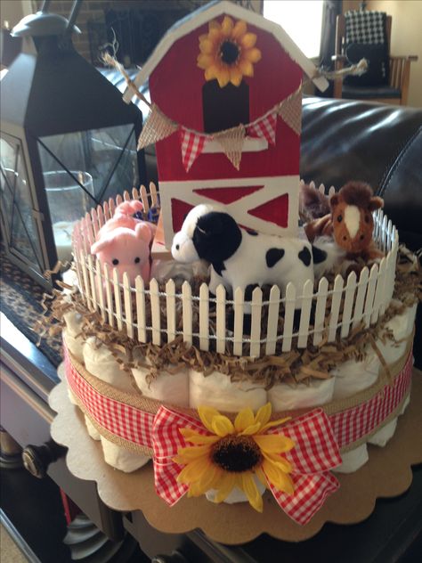 Farm themed diaper cake Farm Baby Shower Theme, Cowboy Baby Shower Theme, Cake Pinterest, Baby Bouquet, Cow Baby Showers, Diaper Gifts, Farm Baby Shower, Animal Baby Shower Theme, Cowboy Baby Shower