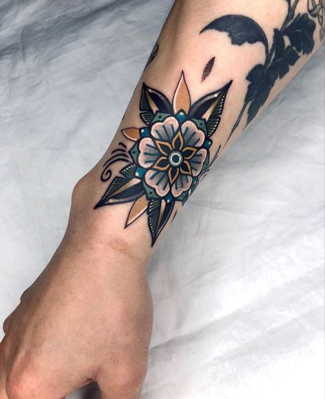 Elbow Tattoo Ideas Women, Black Traditional Flower Tattoo, Large Tattoo Cover Up Ideas, Old School Floral Tattoo, Forearm Tattoo Women Traditional, Cover Tattoo Ideas Women, Traditional Cover Up Tattoo, Traditional Wrist Tattoo, Traditional Style Tattoo For Women