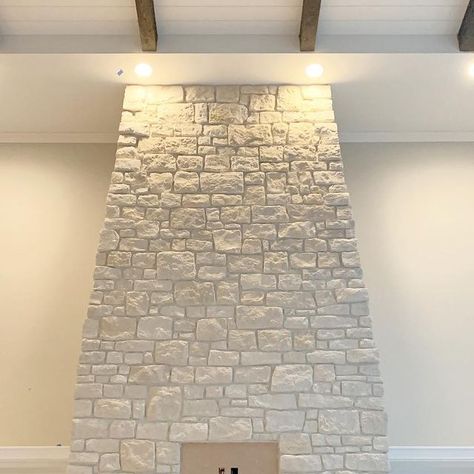 Jordyn Smith on Instagram: "Fireplace is ✔️ . The bottom half grout is a bit darker as it’s still wet. I’m so happy we went with the light stone and light grout. It’s fresh, clean and just perfect! I knew from day 1 I wanted light stone, with light grout and am happy I stuck to my guns on this decision. . . Building a house will always be an area for compromises. This is an area that I definitely am happy my hubby compromised with me on. What decisions did you get a win on? . #fireplacegoals #co My Hubby, Happy We, Grout, Rough Cut, So Happy, A House, Always Be, Basement, Building A House