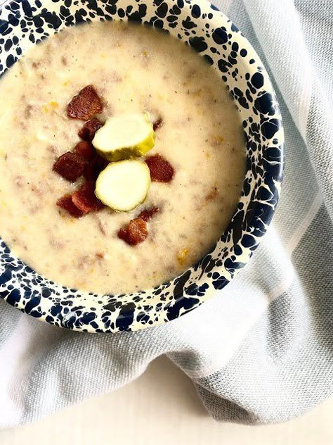 Soup season is here and this one is a dandy!Crockpot Dill Pickle Bacon Cheeseburger Soup is pretty much heaven in a bowl. I realize I may lose some fans over this new recipe.It is what it is.I've been home {trying to work} with a sick five year old by my side the past two days. It's amazing how quick I've gotten used to the home to myself during the day to get done whatever I want to get done. I'm also a bit sleep deprived {again, sick kid}, so if this new recipe sounds weird to you,… Burger In A Bowl, Dill Pickle Soup, Pickle Soup, Bacon Cheeseburger Soup, Cheeseburger Soup, Dill Pickles, Bacon Cheeseburger, Fried Vegetables, Bread Bowls