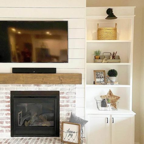 23 Cozy Coastal Fireplace Ideas Where You Can Cuddle Up Over Grouted Brick, Coastal Fireplace Ideas, Limewashed Brick, Electric Fireplace Ideas, Lime Wash Brick, Coastal Fireplace, Fireplace Mantel Ideas, Brick Fireplaces, Wall Style