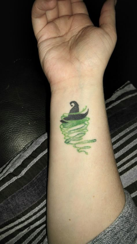 Wicked Witch of the West tattoo Small Broadway Tattoos, Wicked Witch Of The West Tattoo, Wicked Defying Gravity Tattoo, Elphaba Tattoo Ideas, Unlimited Tattoo Wicked, Wicked Musical Tattoo Ideas, Wicked Witch Tattoo, Defying Gravity Tattoo, Wicked Tattoo Designs