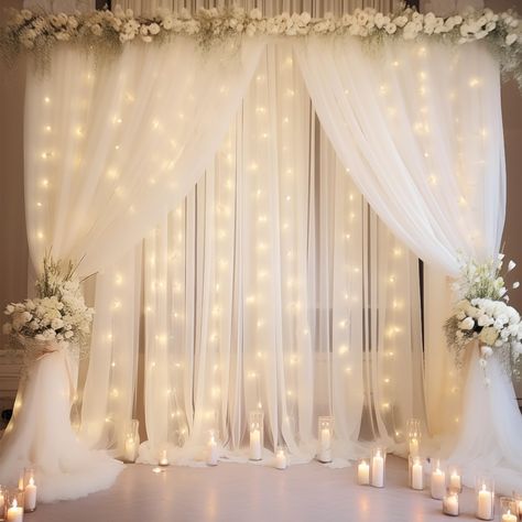 PRICES MAY VARY. Backdrop Curtains with Lights Size: Package including 4 panels 5ft width by 10ft height white backdrop curtains with lights, a set of 9.8ft warm white string light and 24pcs Transparent clips. High quality white tulle fabric curtain with lights for wedding decoration, collapsible without creases, Beautiful Sheers with lights! Can be reused. If you want a thicker/fuller look, you would need more Dreamy Wedding Backdrop Display: This wedding photo backdrop is perfect to create bea Bridal Party Table Backdrop, Sheer Curtain Backdrop, Curtain With Lights, White Tulle Backdrop, Curtain Lights Wedding, Wedding Door Decorations, Drapes For Wedding, White Tulle Fabric, Indoor Wedding Decorations