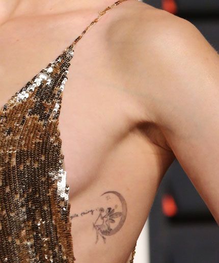 Lily Collins New Tattoo | Lily Collins debuted a new tiny tat. #refinery29 http://www.refinery29.com/2016/03/105162/lily-collins-new-tattoo Fairy Tale Tattoo, Get Ex Back, Fairy Tattoo Designs, Get Your Ex Back, Fairy Tattoo, Custom Tattoo Design, Lily Collins, Custom Tattoo, Pretty Tattoos