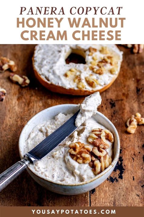 Bowl of panera bread copycat honey walnut cream cheese with a knife resting on top. Bagel Schmear Recipe, Honey Walnut Cream Cheese, Bagel Spread Recipes, Walnut Cream Cheese, Cream Cheese Spread Recipes, Bagel Spread, Panera Copycat, Flavored Cream Cheeses, Walnut Cream