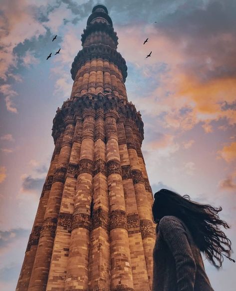 The Qutb Minar, also spelled as Qutub Minar, or Qutab Minar, is a minaret that forms part of the Qutb complex, a UNESCO World Heritage Site in the Mehrauli area of Delhi, India.  Image Credit📷: @thenerdynomad_  #EWSHolidays #Beautiful #Colourful #Sky #QutubMinar #NewDelhi #India #Asia #Heritage #LandScape  #Holiday #Travel #Outdoor #Explore Qutub Minar Photography Poses, Qutub Minar Photography, Qutab Minar, Qutb Minar, Delhi Tourism, Colourful Sky, Qutub Minar, Delhi Travel, Taj Mahal India