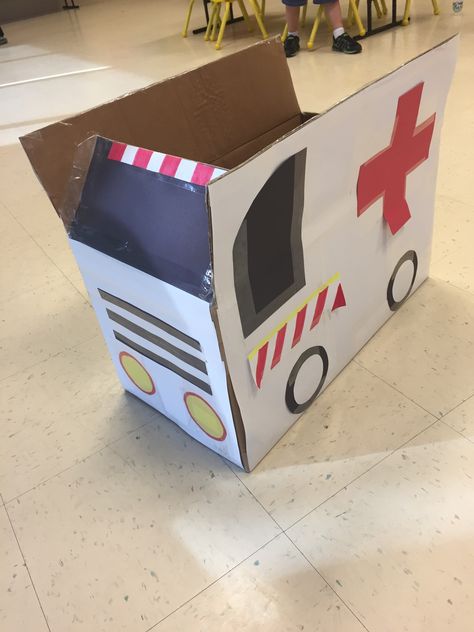 Ambulance car made with moving box Ambulance Activities For Preschool, Ambulance Craft, Cardboard Bus, Golf Cart Decorations, Transportation Preschool Activities, Easy Preschool Crafts, Cardboard Car, Transportation Preschool, Toddler Arts And Crafts