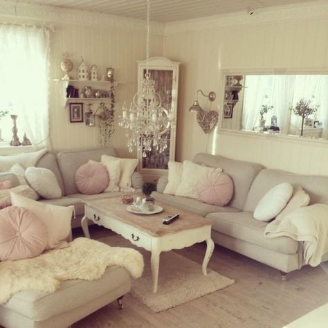 a neutral shabby chic living room with a grey sectional, white and pink pillows, a crystal chandelier and lots of pretty accessories Shabby Chic Living Room Design, Shabby Chic Decor Living Room, Salon Shabby Chic, Cottage Shabby Chic, Apartment Decoration, Estilo Shabby Chic, Shabby Chic Living, Glam Living Room, Decor Ikea