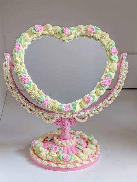 VINTAGE HEART FLORAL CAKE MIRROR Introducing our delightful cake mirror inspired by Vintage cakes and built to last. (Ideal for a variety of purposes) 1. Photography: Capture its charm in photos. 2. Versatile Props: Use it as a prop for special occasions and photoshoots. Ideal for birthdays, weddings, baby showers, and more. 3. Display: Perfect for displaying in bakeries, coffee shops, and more. 4. Thoughtful Gifting: A unique and meaningful gift. 5. Elevating Your Home Decor: Enhance your livin Cake Mirror Diy, Sweet Decoration Ideas, Vintage Home Ideas, Cake Mirror, Vintage Heart Cake, Craft Cafe, Cake Frame, Birthday Props, Mirror Cake