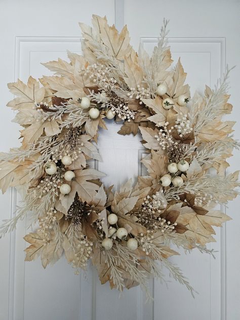 This nuetral colored wreath has beautiful maple leaves, and creamed colored berries. It will look great on your front door, or on a mantel inside. It measures approximately 22x22. Free Shipping Returns and exchanges or cancellations are not accepted. However, please contact us if you have issues with your order. We strongly suggest that you hang your wreath in a well-protected area, sheltered from the weather. Our wreaths make wonderful gifts for family and friends. We will gladly include a gift card with your message and send it directly to the recipient for you. We will do this at your request and wording. Use the message box and check the "ship to" address. See all our designs at www.etsy.com/shop/BlueMountainWreaths Thank you for shopping at Blue Mountain Wreaths Leaves Wall Decor, Fall Neutrals, Fall Fest, Awesome Tattoos, Fall Thanksgiving Decor, Wreath Wall, Maple Leaves, Message Box, Thanksgiving Decor