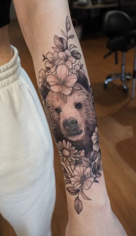 Black Bear Head Tattoo, Bear Tattoo Ideas For Women Thigh, Bear And Floral Tattoo, Pretty Bear Tattoos, Bear Tattoo Sleeve Women, Bird And Bear Tattoo, Bear And Sunflower Tattoo, Bear Sleeve Tattoo For Women, Bear Tattoos With Flowers