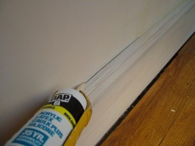 This ugly crack between the wall and baseboard will disappear once caulk fills the gap. PHOTO CREDIT: Tim Carter Base Board Trim, Caulk Baseboards, Caulking Tips, Home Fix, Mediterranean Decor, Home Remodel, French Doors Interior, Home Repairs, Paint Ideas