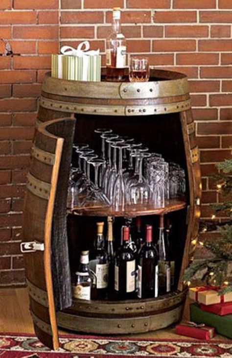 13. TURN AN OLD BARREL INTO A MINI HOME BAR Wine Barrel Bar Table, Wine Barrel Bar, Barrels Diy, Wooden Barrels, Barrel Projects, Barrel Bar, Glasses Storage, Barrel Furniture, Diy Outdoor Decor