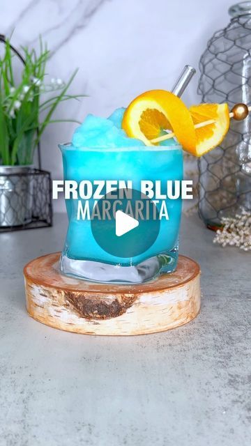 Cocktails with The Whiskey Chick -📍Miami 🌴 on Instagram: "Frozen Blue Margarita ✨ recipe⤵️

It’s still Margarita week and we’re still celebrating!! Actually the celebration JUST started ☺️😂

2 oz Tequila
1 oz Blue Curaçao
🧊: lemonade 
Garnish: orange slice
——
1- freeze your lemonade ice cubes overnight 
2- in a blender combine you’re ice, and remaining ingredients and pulse 
3- pour, garnish & serve 
#Cheers

#CocktailsWithWhiskey #Margarita #drinks #frozenmargarita #NationalMargaritaDay #tequila #cocktails #recipe #recipeoftheday" Frozen Blue Margarita Recipe, Lemonade Garnish, Blue Margarita Recipe, Mark Morrison, Margarita Drinks, Blue Margarita, The Mack, Frozen Blue, National Margarita Day