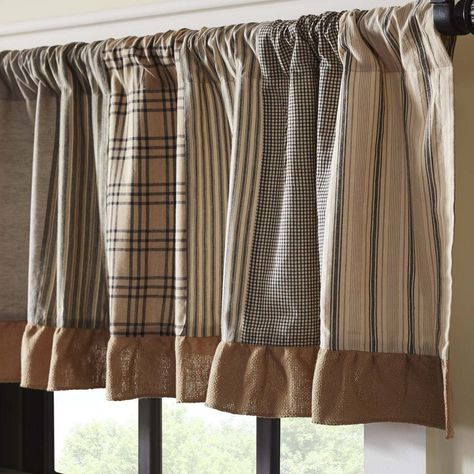 Sawyer Mill Patchwork Valance | Dress up your window with the Farmhouse inspired Sawyer Mill Patchwork Valance with its vertical strips of ash grey, creme, black plaid and striped patches. The valance is finished with a hem fold and the bottom and trimmed with a 3" natural burlap gathered ruffle. Vertical strips of ash grey, creme, and black plaid and striped fabrics; Lined with white cotton; Hem fold; bottom trimmed with 3" natural burlap gathered ruffle; Features 3.25" rod pocket; Machine stit Farmhouse Valance, Farmhouse Kitchen Curtains, Curtains Blue, Vhc Brands, Tuscan Kitchen, Farmhouse Curtains, Fox Decor, Cottage Style Decor, Primitive Kitchen