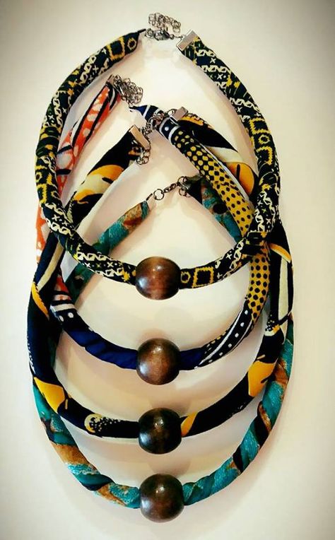 MULTICOLORED ROPE NECKLACE. Afrocentric Ankara African Necklaces, Afrocentric African Fabric Necklaces, Ankara Necklaces, Tribal Rope Necklaces, Ankara Fabric Necklaces. #Ankara #Melanin #HandCraftedJewelry #FabricJewelry #AfricanPrint #AfricanInspired #AfricanFabricJewelry #MelaninPoppin #AfricanNecklace #AnkaraNecklace #MelaninOnFleek #BlackGirlsRock #AfricanGirlsKillingIt #BlackExcellence #TeamNatural #BlackGirlMagic #Kente #AnkaraFashion #MyBlackIsBeautiful Natural Hair Faux Locs, Ankara Necklace, African Fabric Accessories, African Bangles, African Necklaces, Braids Goddess, Goddess Faux Locs, Fabric Necklaces, Diy Statement Necklace