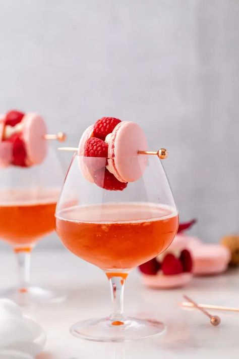 ispahan macaron cocktails, inspired by the French pastry. Mixed with lychee, and raspberry liqueur, almond syrup and champagne. Perfect for Valentine's Day Romantic Cocktails, Baking Lessons, Macaron Cake, Sparkling Cocktail, Rose Cocktail, Raspberry Liqueur, Popular Desserts, Elegant Desserts, Macaron Recipe