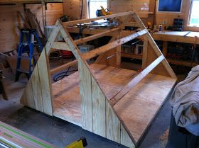 I recently completed the pig's new shelter for when they are relocated onto pasture.  I knew that I wanted to build a simple A-frame for the... Sheep Enclosure, Livestock Feeders, 4h Pigs, Pig Hut, Pig Houses, Pig Pens, Pig Shelter, Pigs Farm, Kune Kune Pigs