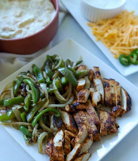 Blackstone Chicken Fajitas are the easiest Summer dinner and are loaded with flavor. Plus, it's all cooked outside on the Blackstone griddle! Best Chicken Fajitas, Blackstone Chicken, Crockpot Chicken Enchiladas, Grilled Peppers And Onions, Simple Marinade, Southwest Chicken Salad, Baked Chicken Tacos, Homemade Fajita Seasoning, Marinating Chicken Breast