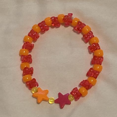 Pink and orange star bracelet kandi singlet Kandi Inspo, Orange Star, Kandi Ideas, Star Bracelet, Pink And Orange, Phoenix, Arts And Crafts, Bracelet, Orange