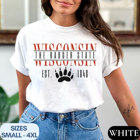 The Badger State Comfort Colors Wisconsin Shirt, Midwest T Shirt Gift Wisconsin Tshirt State Name Shirt WI Tee College Apparel University by AllianasCreations on Etsy College Apparel, Top Gifts, College Outfits, Badger, Shirts For Girls, Comfort Colors, Wisconsin, San Jose, Sweater Top