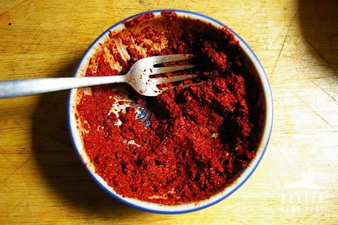 Bowl of freshly ground red recado in a bowl. Recado Recipe, Belize Recipes, Stewed Chicken, Stew Chicken Recipe, Bouillon Cube, Chicken Stew, Food Staples, Chicken Seasoning, Coleslaw