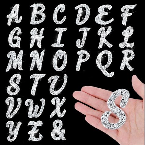 PRICES MAY VARY. ✅ 𝗛𝗜𝗚𝗛 𝗤𝗨𝗔𝗟𝗜𝗧𝗬 - Our glitter letter stickers boast a luxurious touch, featuring small rhinestones meticulously arranged in an italic font for enhanced elegance. Crafted with strong adhesive material. Each letter stands at 6.5cm tall, adding a distinctive appeal to your creations. ✅ 𝗣𝗘𝗥𝗙𝗘𝗖𝗧 𝗙𝗢𝗥 𝗗𝗜𝗬 - Our collection of bling rhinestone stick on letters comprises of complete alphabet from A to Z, along with an additional set of 6 letters. Easily create desig Sticker Letters, Italic Font, Patches For Clothes, Letter Patches, Sticker Machine, Clothes Art, Rhinestone Sticker, Iron On Letters, Rhinestone Letters