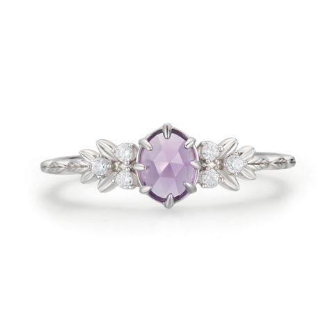 Indulge in the free-spirited charm of our Wildflower Amethyst Ring. This beauty showcases a rose-cut oval amethyst gemstone nestled in an exquisite leafy band with white topaz accents. An alluring piece that embodies the carefree beauty of nature's most captivating blooms. So, dance in the sun, chase your dreams and let this ring be your guiding light along the way. Made in 14K white gold vermeil (14K white gold plated over a sterling silver base). To extend the life of your gold vermeil jewelry Bff Rings, Amethyst Ring Vintage, Gold Vermeil Jewelry, Guiding Light, Ring White Gold, Silver Gemstone Jewelry, Chase Your Dreams, Amethyst Jewelry, Vermeil Jewelry