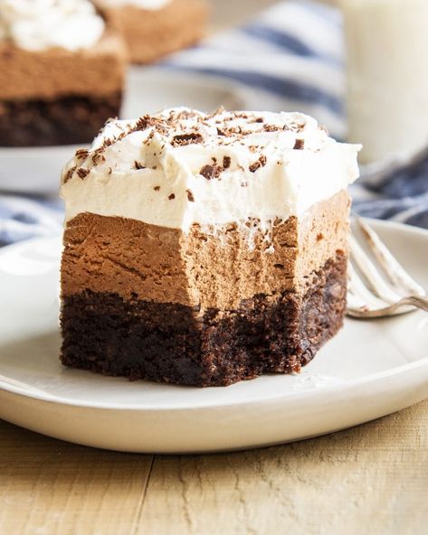 A bite taken out of a french silk brownie. French Silk Brownies Recipe, French Silk Cake, Chocolate Silk Brownies, Add Ins For Boxed Brownies, Brownies Fancy, Brownie Whipped Cream Dessert, Mini French Silk Pie, Brownies Boxed Add Ins, French Silk Pie Brownies