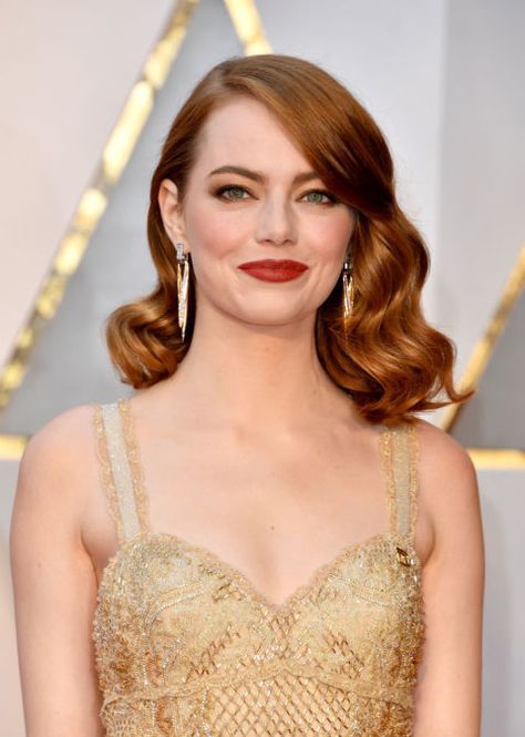 Bombshell Waves Emma Stone's red lob at the 2017 Oscars lent itself perfectly to some Old Hollywood waves, while side-swept bangs helped to elongate the appearance of her face. See more haircuts that are perfect for round face shapes at GoodHousekeeping.com. New Blonde Hair, Emma Stone Hair, Red Carpet Hair, Hollywood Waves, Round Face Haircuts, Short Wedding Hair, Hairstyles For Round Faces, Emma Stone, Mode Inspo