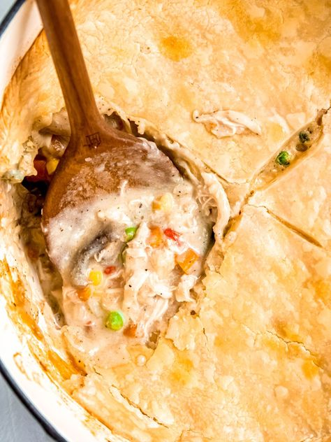 If you're on the lookout for a healthy dinner that is the textbook definition of comfort food, look no further than my Dutch Oven Chicken Pot Pie. Tender chicken and al dente veggies are bathed in a rich and creamy white sauce, covered in a buttery, flaky pastry crust, and baked to perfection for a meal the whole family is sure to love. Chicken Pot Pie Dutch Oven, Dutch Oven Pot Pie, Campbells Chicken Pot Pie, Dutch Oven Chicken Pot Pie, Oven Chicken Pot Pie, Dutch Oven Chicken, Creamy White Sauce, Easy Chicken Pot Pie, Quick Healthy Dinner