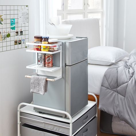 Features: Versatile shelving unit to maximize space in college dorm rooms, office breakrooms, and small kitchens Strong magnets on the back adhere shelves to your refrigerator, freezer, or compact mini fridge Wooden dowel holds paper towel for quick and… Dorm Kitchen Essentials, Dorm Closet Organization, Dorm Room Setup, Dorm Fridge, Small Dorm Room, Small Dorm, Dorm Supplies, Fridge Organizer, Dorm Kitchen