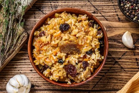 Russian Lamb Pilaf (Plov) Recipe Russian Christmas Food, Plov Recipe, Lamb Pilaf, Raisin Rice, Slavic Recipes, Chicken Pilaf, Russian Foods, Dried Prunes, Russian Dishes