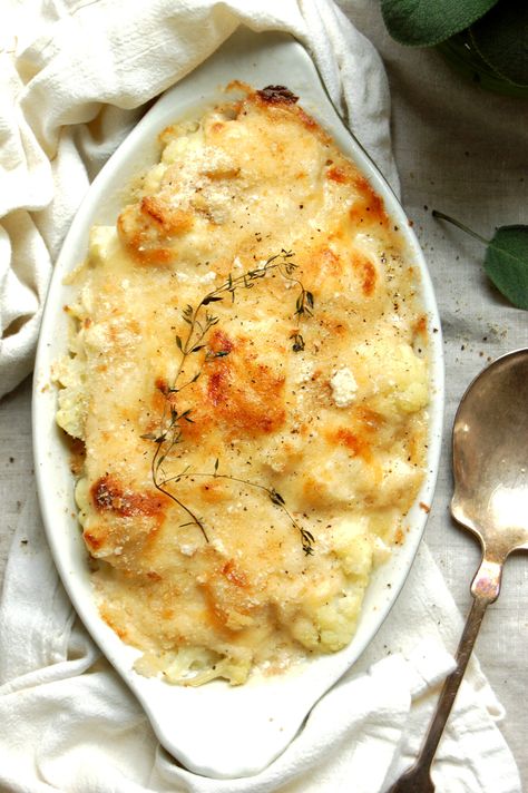 Few things are as satisfying as this creamy baked cauliflower gratin recipe -- including mac n' cheese. Get the recipe for this Ina Garten-inspired side. This cauliflower recipe uses chunky florets instead of riced for satisfying bulk. Plant based, vegetarian, pure comfort food, and an ohhh so amazing side dish for dinner. . . . . . #cauliflower #cauliflowergratin #macncheese #cauliflowerrice #dinnerrecipes #sidedishes #dinner #comfortfood Baked Whole Cauliflower, Cauliflower Gratin Recipe, Dinner Cauliflower, Easy Veggie Side Dish, Best Ina Garten Recipes, Dinners Under 500 Calories, Cauliflowers, Cauliflower Gratin, Veggie Casserole