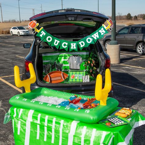 Host a top-notch football party for up to 16 of your nearest and dearest! This football party decorating kit can help set a winning scene whether you're cheering on your favorite team or hosting a football-themed birthday party. Just add finger foods! (248 pcs. per unit)Includes:o 210-Pc. Plastic Cutlery Sets for 70 (Includes 70 of each: forks, knives and spoons. Approx. 6" each.)o 1 Plastic Football Field Tablecloth Roll (Disposable. Arrives folded in half on a 20" roll. 40" x 100 ft.)o 16 Paper Game On Football Dinner Plates (12" x 9 1/2" Not microwave safe.)o 1 Foil Football Tabletop Fountain (Includes plastic base. 20")o 1 Cardstock Football Touchdown Garland (8 ft.)o 16 Paper Game On Football Beverage Napkins (5" Not microwave safe.)o 1 Vinyl Inflatable Football Buffet Cooler (Inflate Trunk Or Treat Tailgate Theme, Football Themed Trunk Or Treat, Trunk Or Treat Football Theme, Football Trunk Or Treat, Football Field Tablecloth, Football Tray, Football Tailgate Party, Trunker Treat Ideas, Spirit Gear